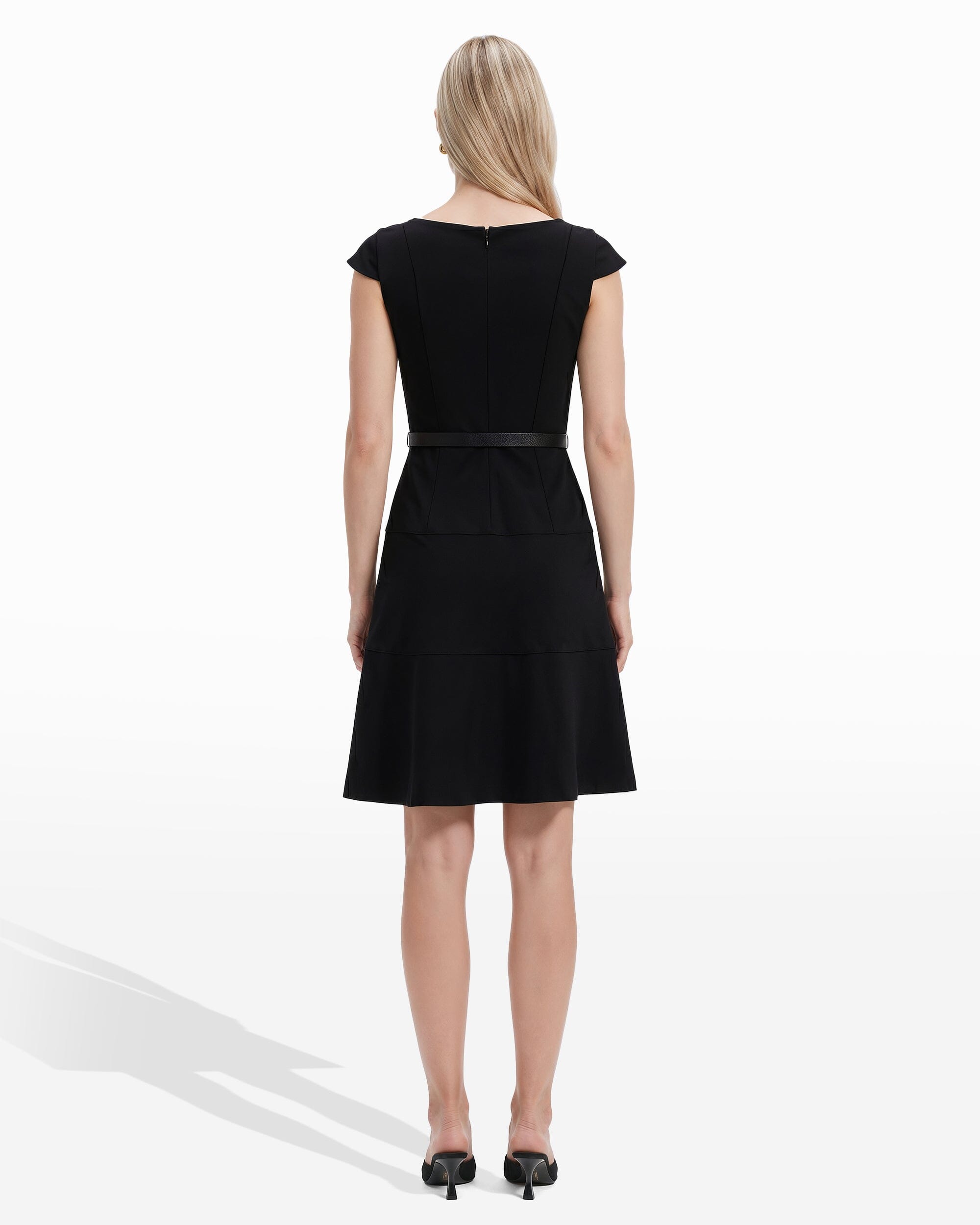Black cap sleeve belted crew neck dress with A-line tiered skirt and back zipper closure