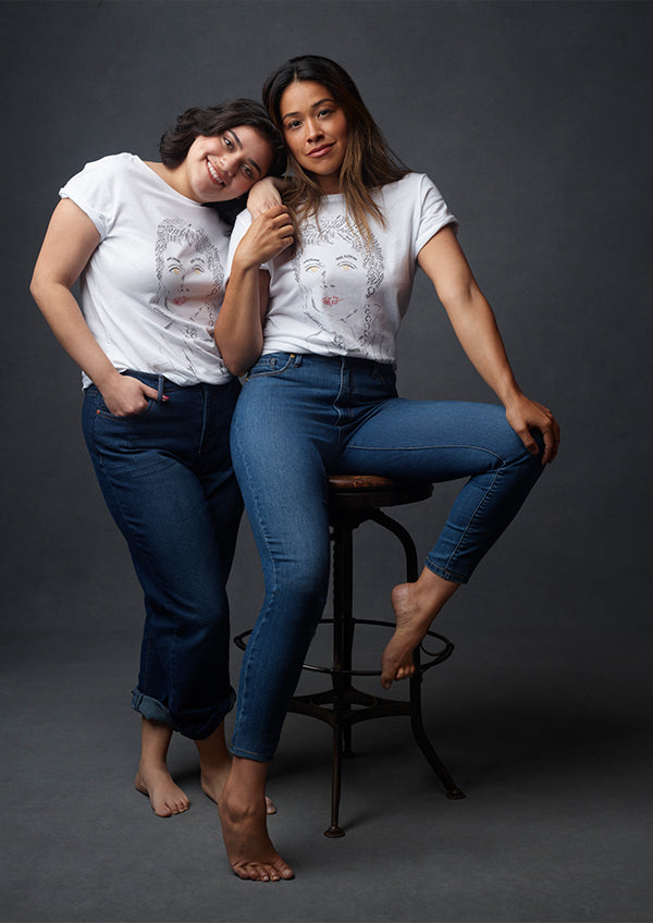 Anne Klein white graphic tee and blue jeans on models